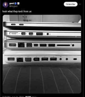 stack of Apple Macs showing far fewer ports with newer models